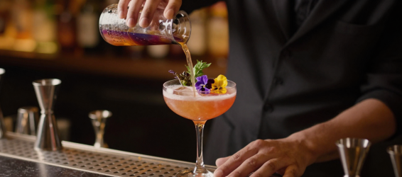 Bartender finishing a signature mocktail